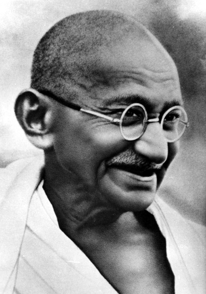 https://upload.wikimedia.org/wikipedia/commons/7/70/Gandhi_smiling_R.jpg